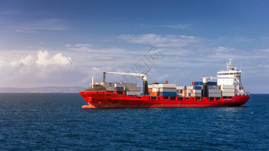 集装箱货船进出口业务物流和国际集装箱船在公海的运输国际集装箱货船背景图片