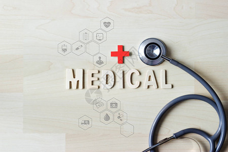 医疗和保健概念听诊器和带有医疗保健图标的木字医疗以及医院和健图片