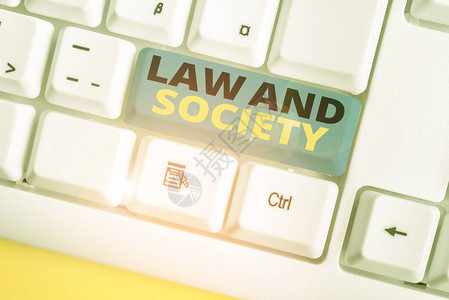 显示法律与社会的文字符号商务照片文本解决法律与社会之间的相互关系白色pc键盘背景图片