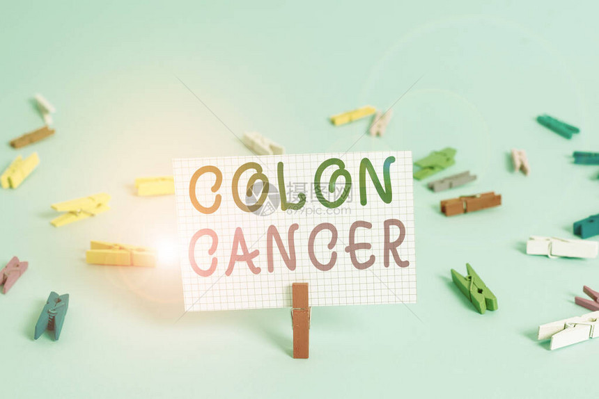 显示结肠癌的文字符号展示结肠或直肠癌细胞发育的商业照片彩色衣夹矩形方图片