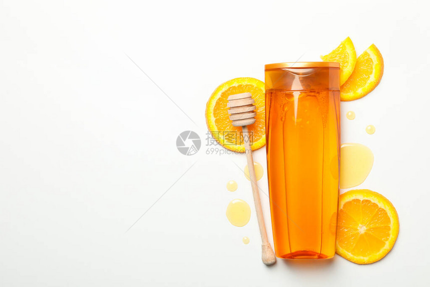 香波瓶橙色切片和白底涂料图片
