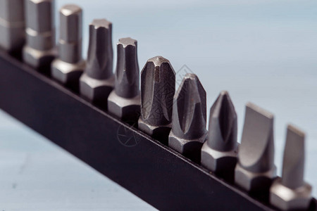 螺丝刀批头螺丝刀的金属钻头家用工具套装不同尺寸的六角驱动背景图片