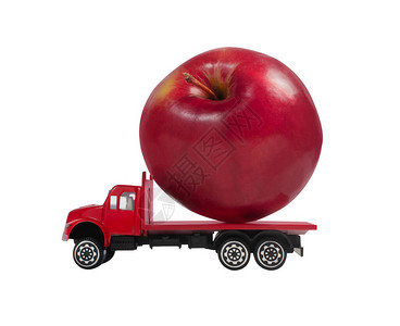 白色背景剖面图视上有苹果货物的玩具卡车的照图片
