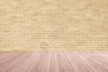 浅黄棕色砖墙红棕色木地板图片