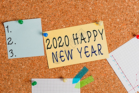 文字书写文本2020新年快乐展示年初庆祝活动的商业照片Corkboard彩色尺寸纸针图钉背景图片