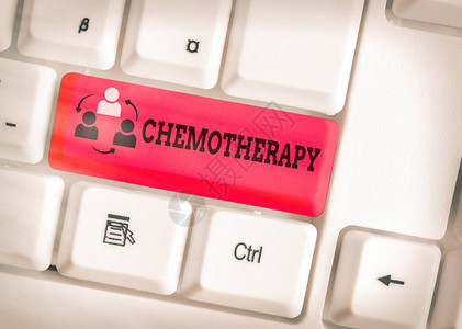 手写文字书写化疗使用化学物质治疗疾病的概念照片白色pc键盘图片