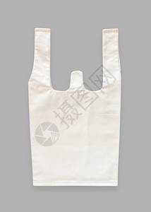 用于生态购物袋样机的手提袋帆布白色棉织物布在灰色背景图片