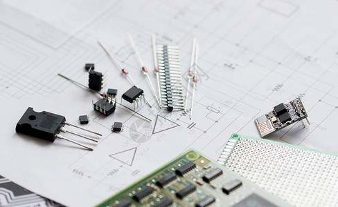示意图上的电子零件二极管微芯片晶体管集成电路电容器电子路和电子板的图片