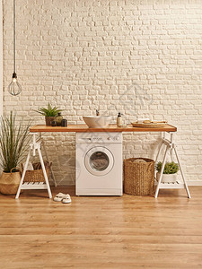 现代浴缸和洗衣机内式概念白砖墙和图片