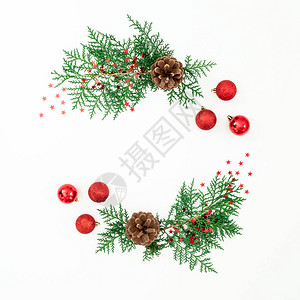 圣诞框架松树枝和白色背景的红装饰图片