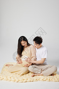 高清孕照素材搞怪的夫妻孕照写真背景