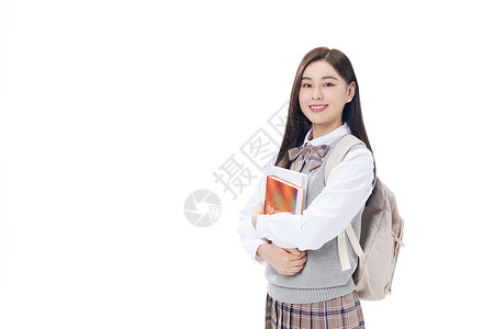抱着书本微笑的女学生背景图片