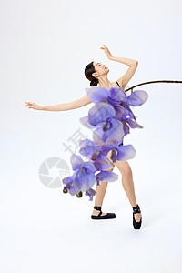 鲜花紫色裙子芭蕾舞者图片