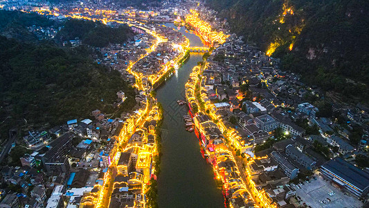 城市水系5A景区镇远古镇航拍夜景背景