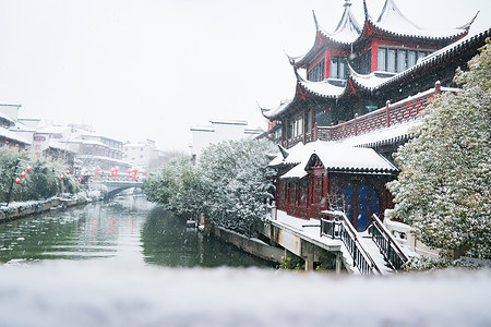 南京古秦淮夫子庙景区大雪纷飞背景图片