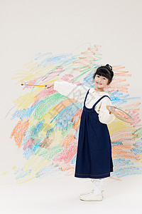 可爱小女孩在墙上画画背景