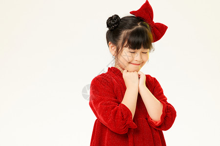 兔年红色外套可爱的小女孩许下新年愿望背景