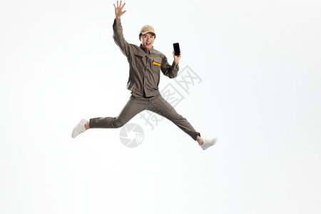 跳跃的快递员手机接单配送形象购物节高清图片素材