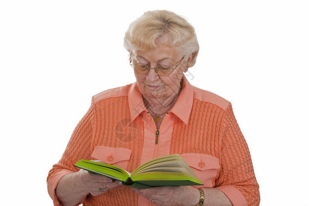有书本的老年女孤图片