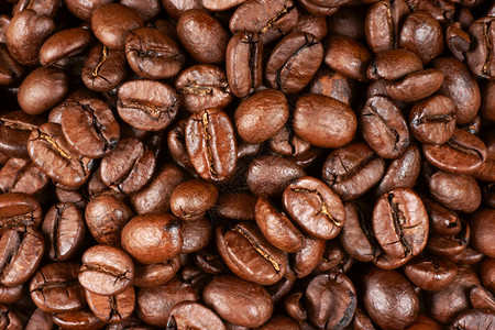烤阿拉比卡咖啡豆的背景图片