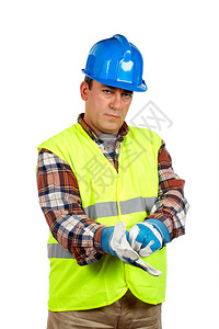 戴着手套和绿色背心的建筑工人图片