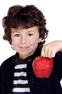 手握一个苹果的可爱的孩子白背景上背景图片