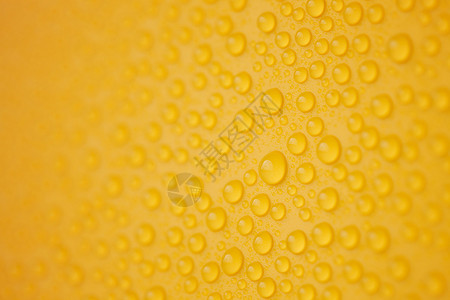 黄色的抽象水滴图片