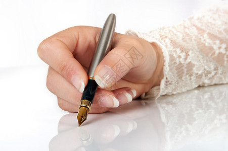 用金色钢笔优雅的手写图片