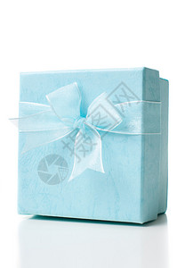 美丽的蓝色礼物盒有弓关闭在白色背景上背景图片