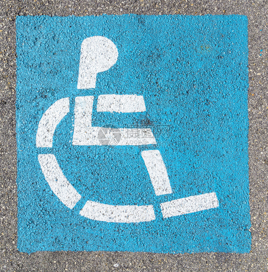 蓝色停车场的轮椅标志图片