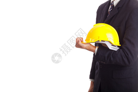 拿着黄色安全帽的建筑工程师图片