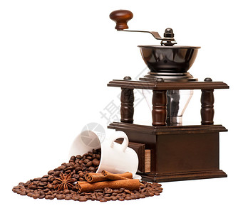 有咖啡豆和咖啡杯的手工咖啡研磨图片