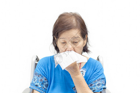 亚洲老妇用手帕擤鼻涕图片