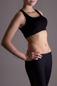 运动中的瘦弱女人的身体穿背景图片