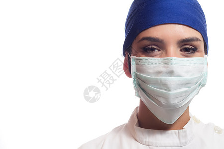 戴着面具和蓝帽的女医生图片