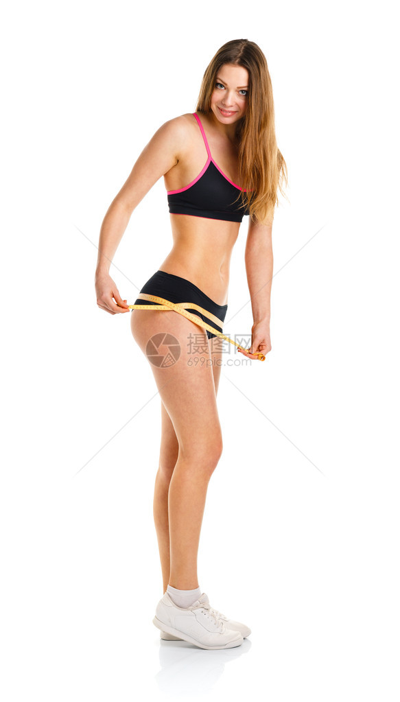 测量美大腿完美形状健康生活方式概念的运动妇图片