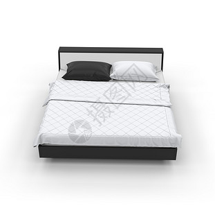 白床和黑色枕头孤图片