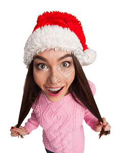年轻模特穿着红色的圣诞礼帽图片