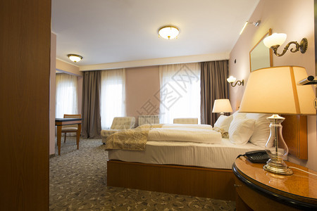 古典风格的酒店卧室内饰背景图片
