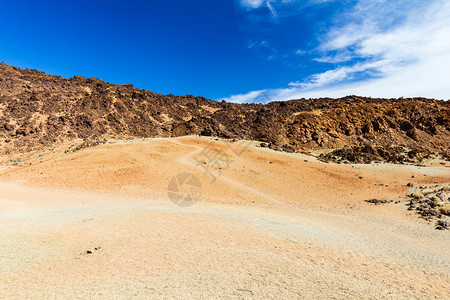 西班牙加那利群岛特内里费岛泰德公园展示了风化的红色火山土壤背景图片