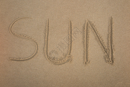 文字太阳在海滩上图片