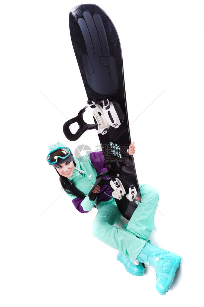 身穿紫色滑雪服蓝色滑雪眼镜和蓝色裤子的白人美女身上图片