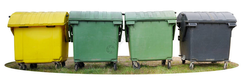 四个大的孤立的塑料垃圾桶位于绿草上物体的颜色黄色绿色和黑色多张照图片