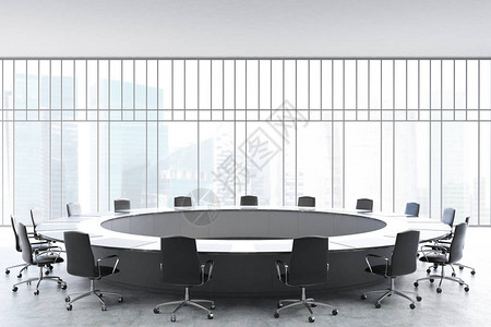 会议室内部配有一张黑色大圆桌办公椅围绕着它图片