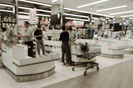 抽象模糊零售柜台收银超市作为背景背景图片
