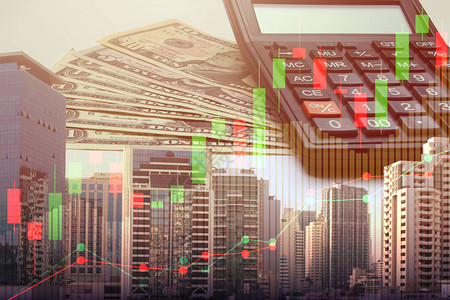 计算器和美元货币与市风景和股票市场或金融图表的双重风险图片