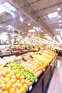 老式模糊抽象有机新鲜生产水果和蔬菜的货架上在德克萨斯州美国模糊的超市杂货店顾客购物bokeh光贩卖高清图片素材
