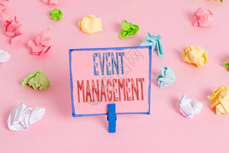 事件管理商业图片展示了规划和分析大型活动或会议的工作彩色折叠纸空白提醒粉红色地板背景衣物的清空提醒牌子Coloredcr背景图片
