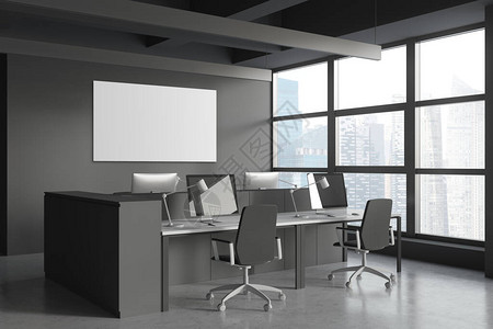 现代开放空间办公室角落的工作场所图片