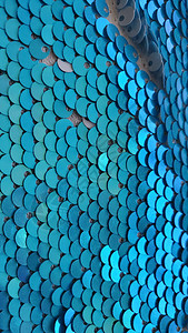 浅蓝色亮片纹理像鱼的大小绿松石闪光织物表面闭合时装色风格会点图片